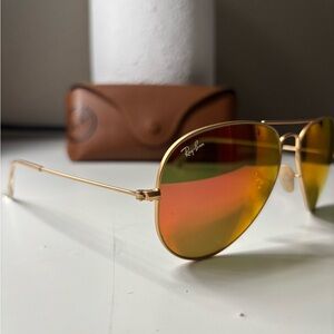 Ray-Ban Gold Frame Sunglasses with Amber-Orange Mirrored Lenses